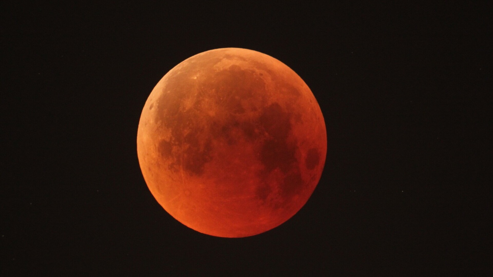 Composite sequence of a total lunar eclipse showing the Moon passing through Earth's shadow